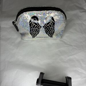 Victoria's Secret Holographic Silver Cosmetic Bag with Black Wing Detail